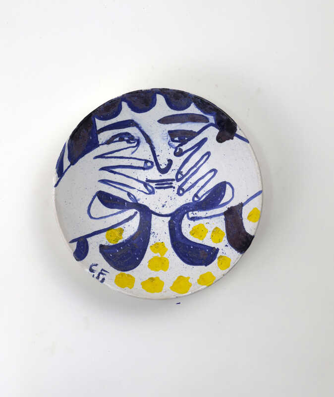 Fingers and yellow dots